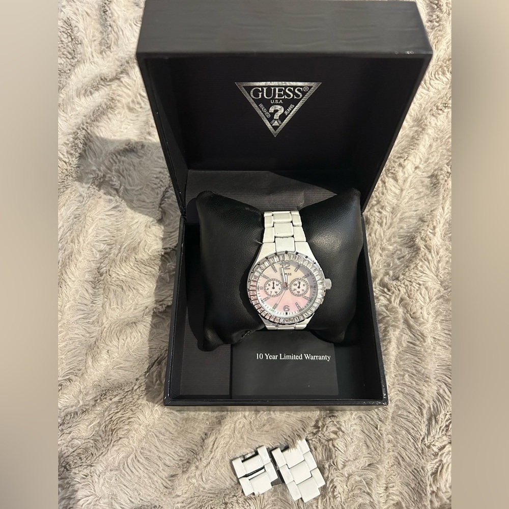 Guess white watch with scratches in sphere and wristband with extra links